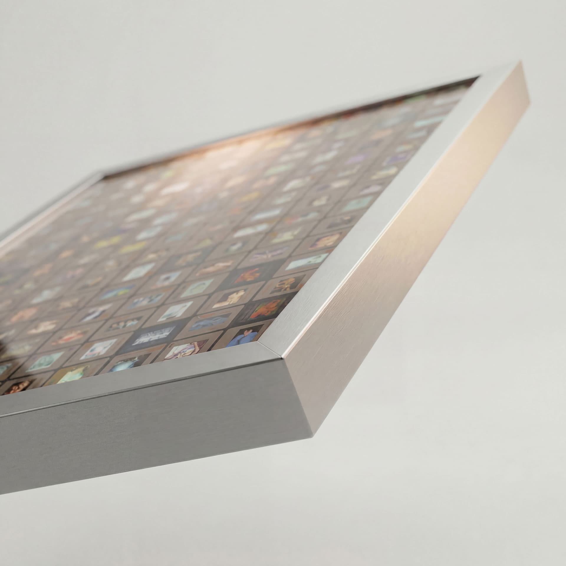 Archive lightboard front view — 160 original 35mm slides backlit in a brushed aluminum frame
